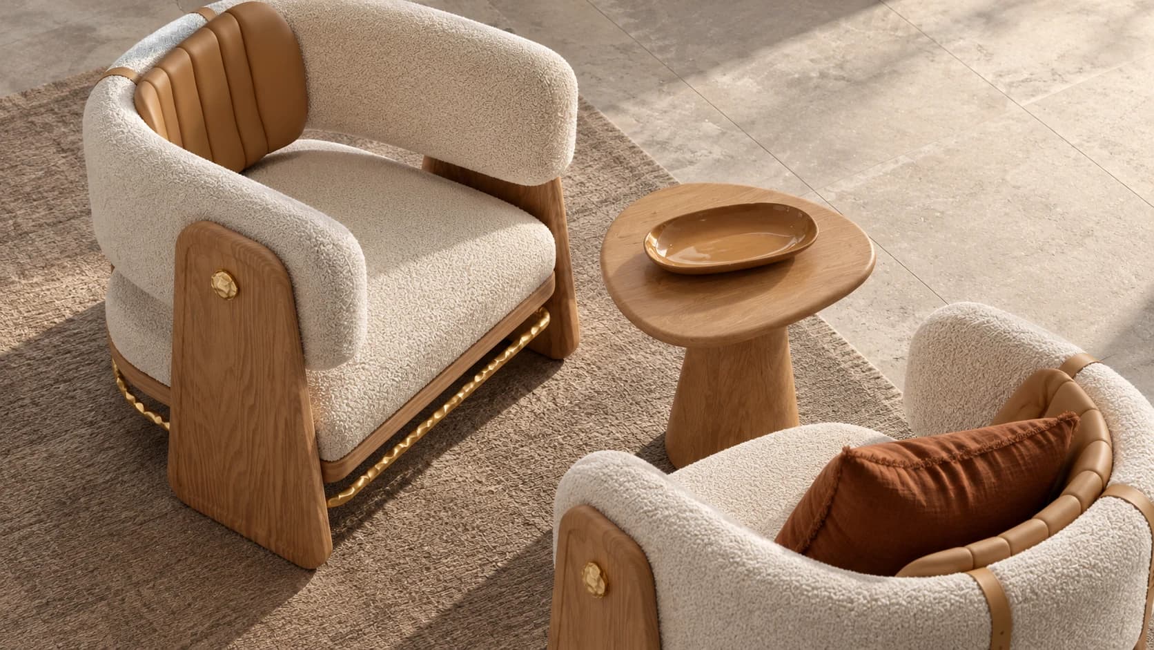 Nuvé lounge chairs with curved cream upholstery and a round side table